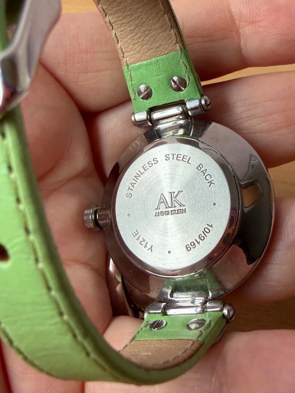 AK Anne Klein Women’s Large Round Silvertone Watch Spring Green Band New Battery